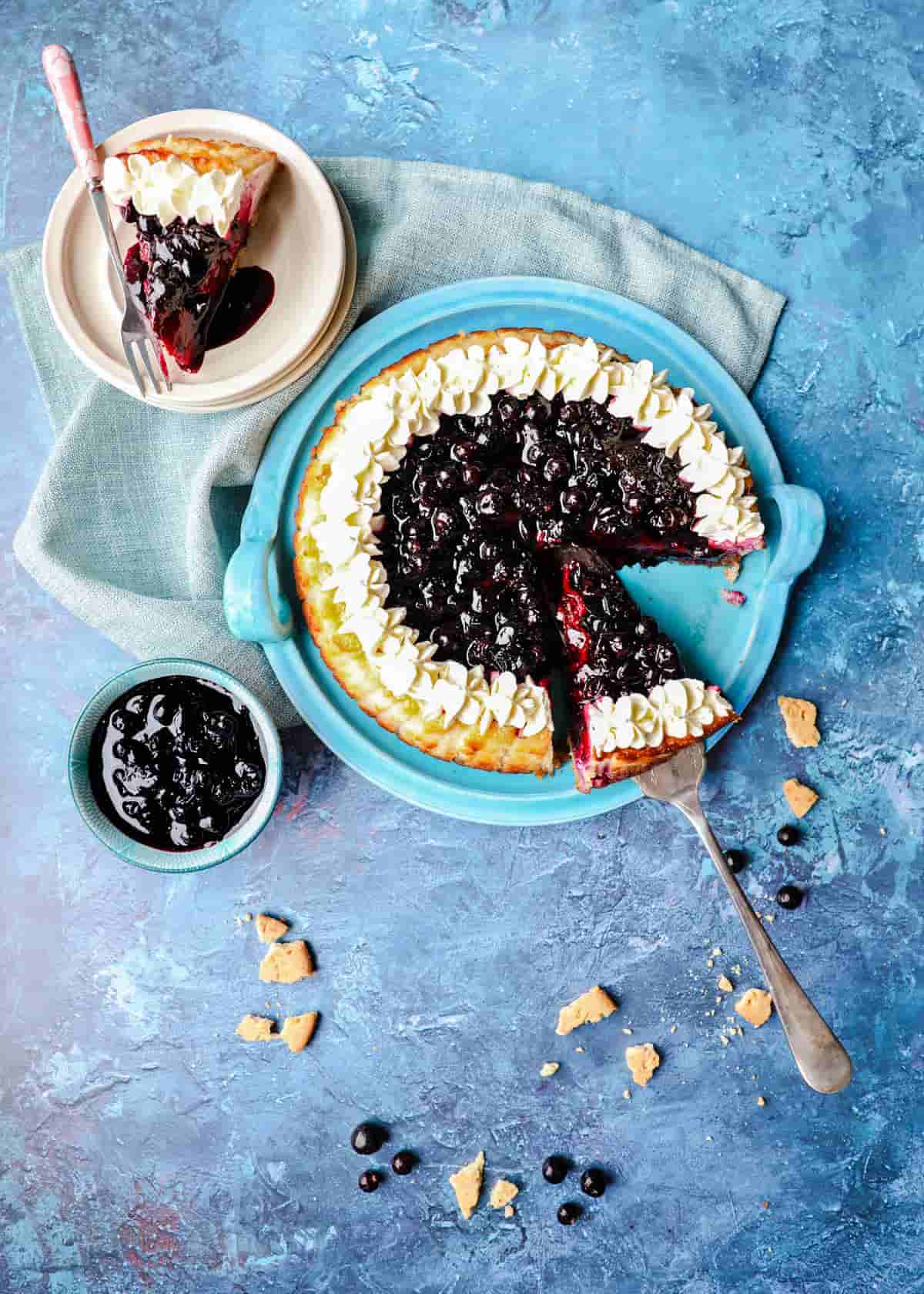 Blackcurrant Cheesecake with slice and blackcurrants