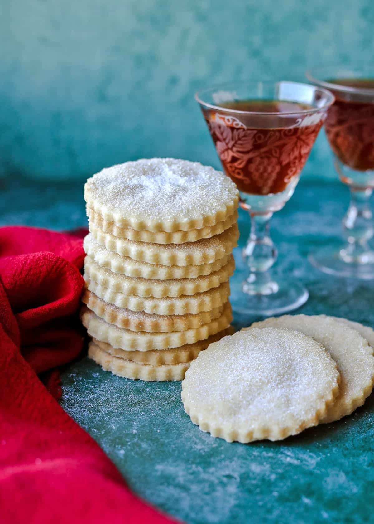 Scottish Shortbread Biscuits stacked with sherry glasses