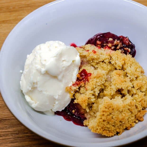 Bowl of fruit crumble with Vanilla Frozen Yogurt