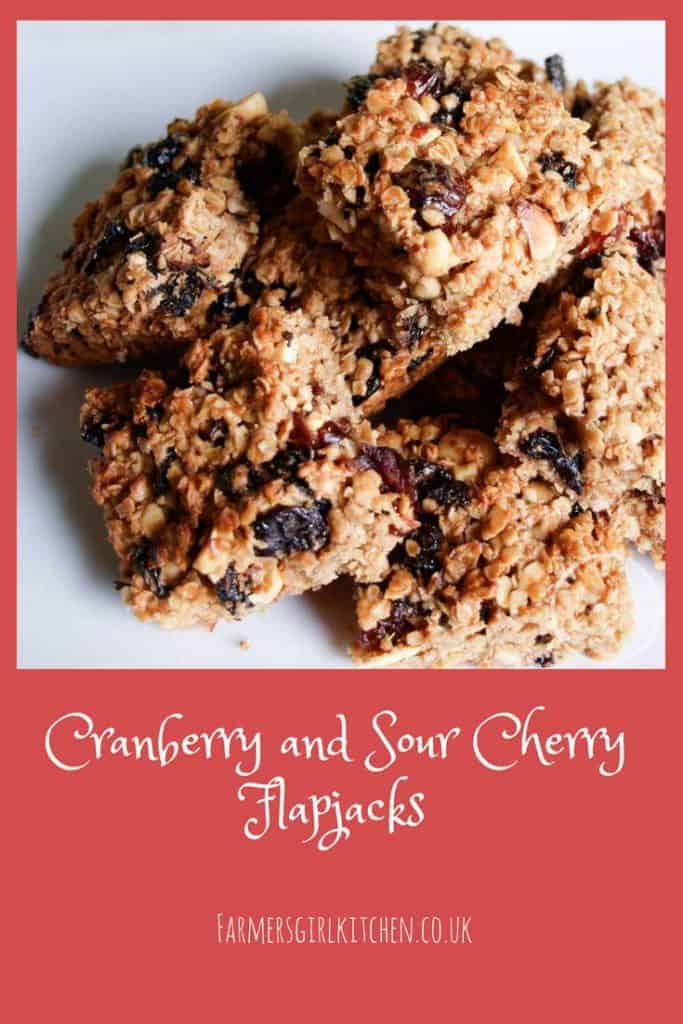 Cranberry and Sour Cherry Flapjack, packed full of oats, berries and nuts #flapjack #oat #bars #cranberries #recipe