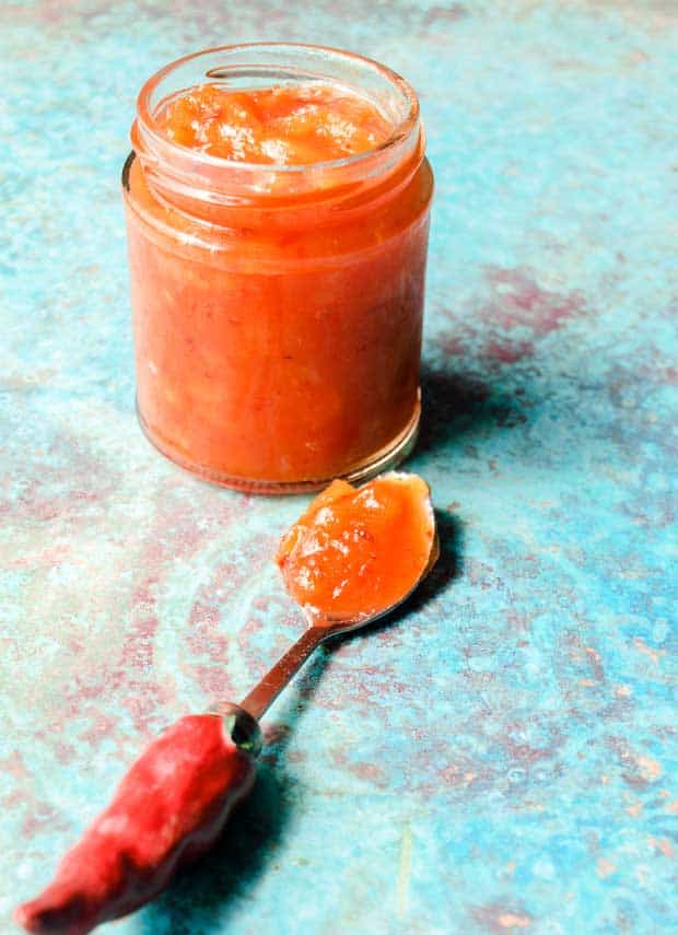 Jar and spoon of Pineapple Chilli Jam 