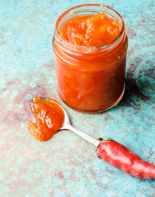 Spoon spilled Pineapple Chilli Jam and jar