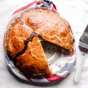 Scottish Mince Beef Pie with a slice taken out