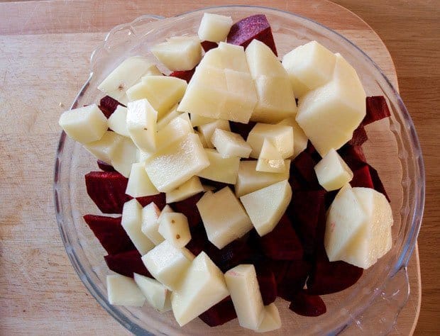 Chopped Diced Potato goes into the Beetroot and Black Cumin Soup with the beetroots