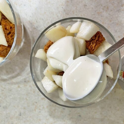 Add custard to Jamaica Ginger Cake and Pear Trifle