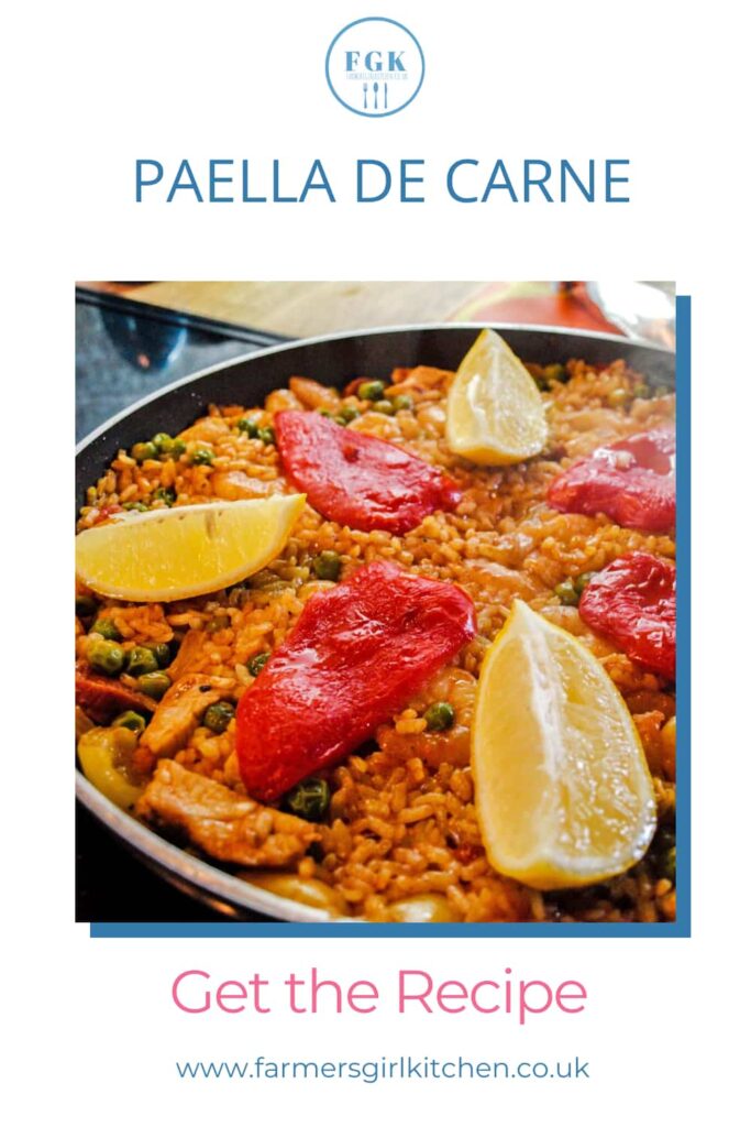 Paella de Carne Spanish rice dish in pan