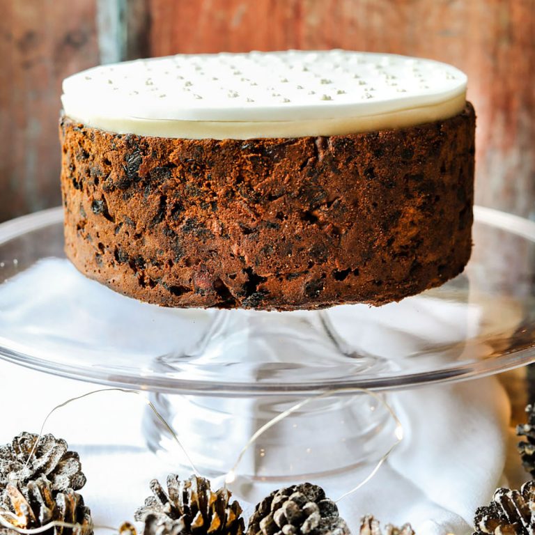 Paul Hollywoods Christmas cake on cake plate