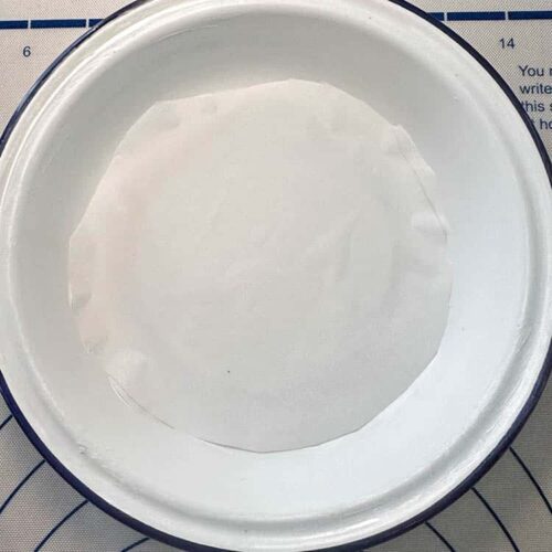 parchment in base of pie plate