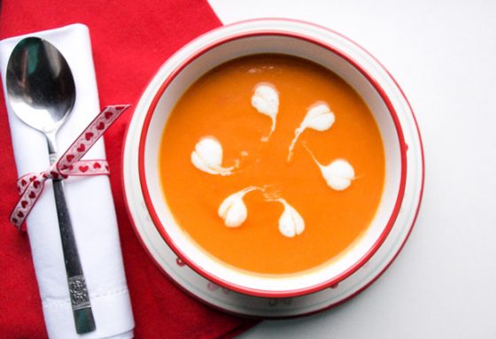 A warming bowl of carrot and tomato soup made in the Froothie Evolve 