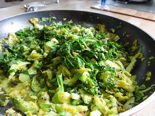 Pan of white and green cabbage
