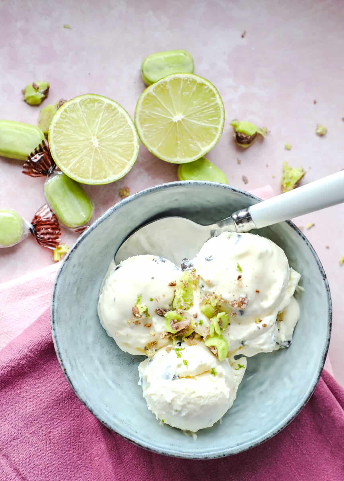 Chocolate Chip Lime Ice Cream in bowl with limes