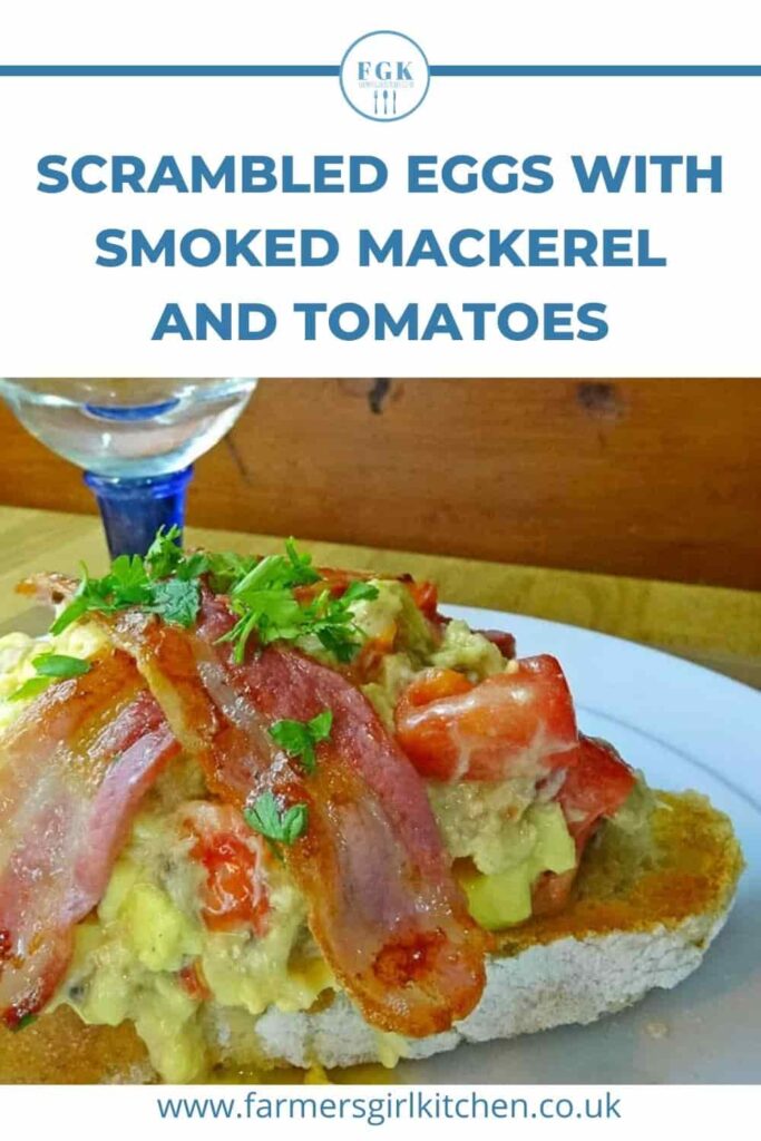 scrambled egs with smoked mackerel and tomatoes on toast with glass of wine.
