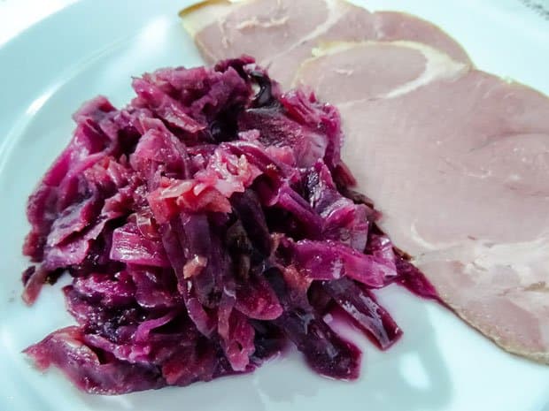 Baked red cabbage served with ham