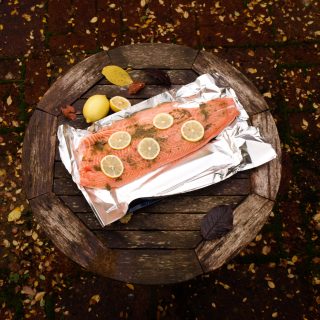 Feed a crowd easily with this simple Salmon Baked with Herbs and lemon