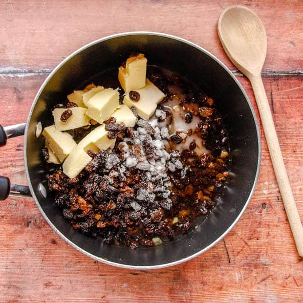 Fruit sugar, butter ans pices in pan for Cloutie Dumpling.