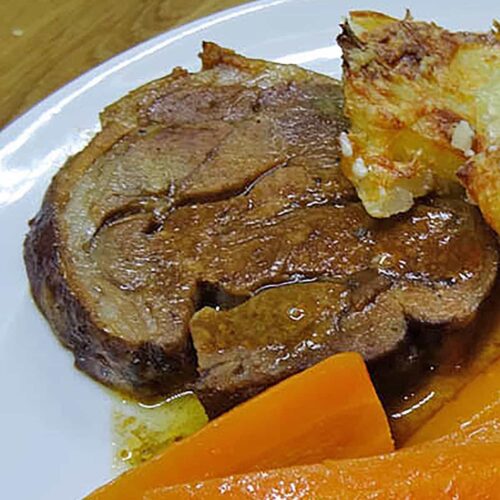 Slow Cooker Asian Spiced Lamb plated with carrots