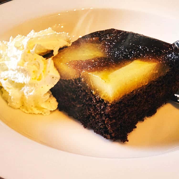 Pear and Gingerbread Upside Down Cake with cream.