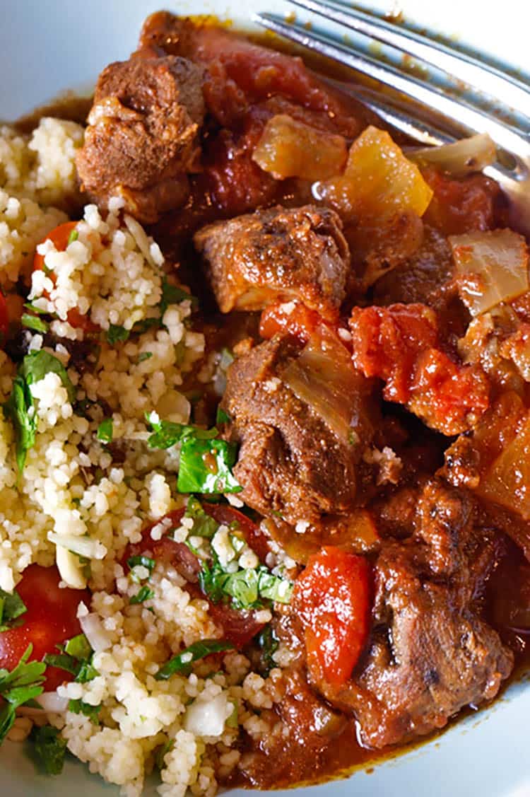 bowl of slow cooker lamb ras el hanout with couscous.