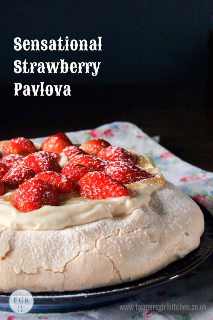 Sensational Strawberry Pavlova is a simple meringue dessert that is truly sensational with a topping of whipped cream and lemon curd topped with fresh strawberries #strawberry #pavlova #meringue #dessert