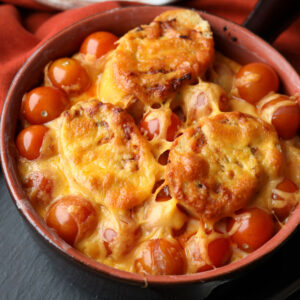 Garlic Bread and Tomato Bake baked with melted cheese