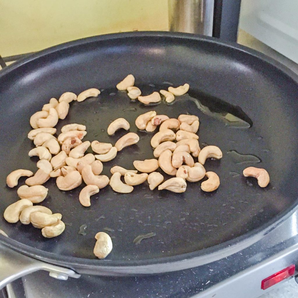 Fried Chicken with Cashew NutsCashew nuts in frying pan