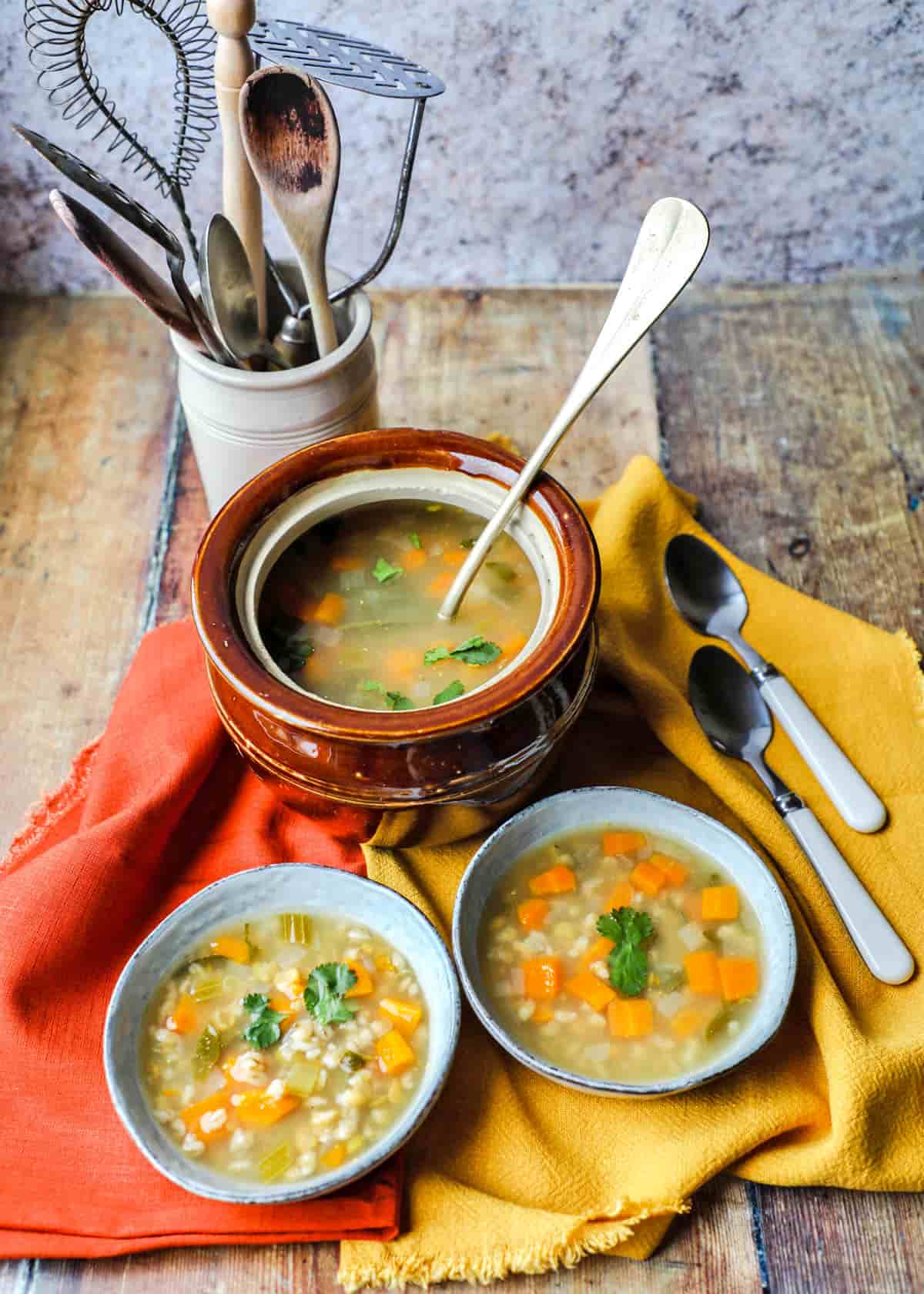 Scotch Broth with bowls, spoons, tureern and kitchen implements
