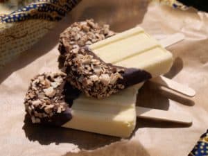 Mango Mousse Ice lollies dipped in chocolate and toasted coconut