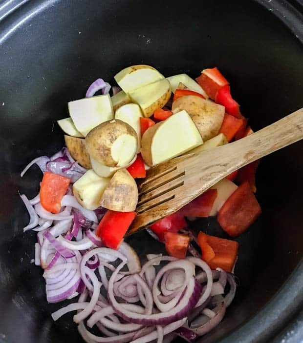 onions, potatoes and red pepper in slow cooker for greek baker's pot 