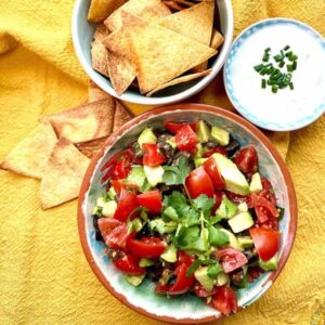 Avocado Salsa with sour cream and tortilla chips