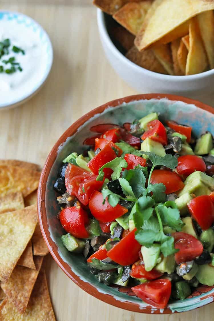 Avocado Salsa in bowl with tortilla chips