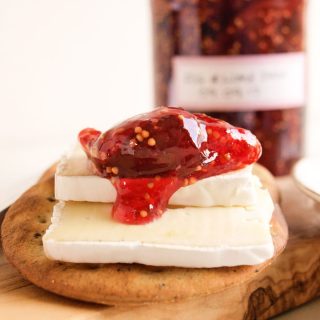 fig and lime jam on cracker with cheese