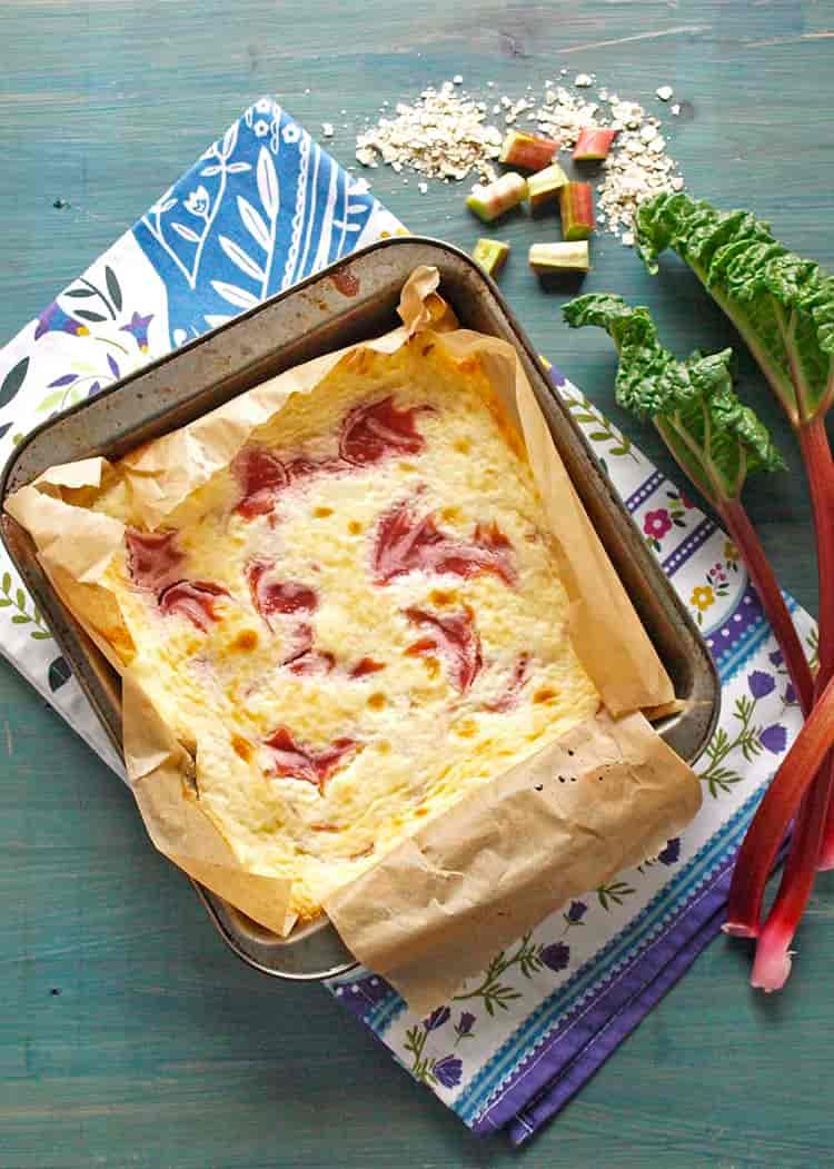 rhubarb cheesecake bars in tin,