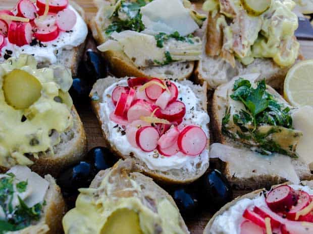 Cicchetti of Bread with fish and vegetable toppings