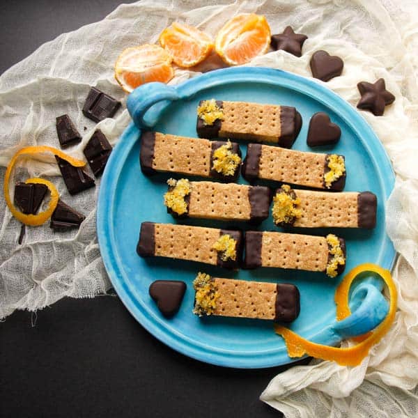 Crisp fingers of Scottish shortbread flavoured with orange zest, dipped in dark chocolate and more sugared zest - so good!