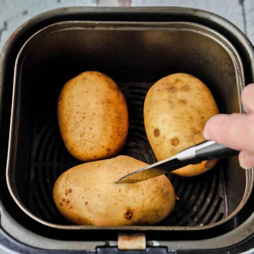 Air Fryer Baked potatoes pierce with a knife