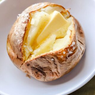 Air Fryer Baked Potatoes with butter
