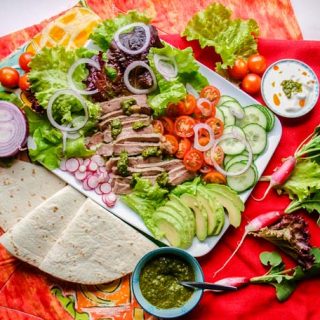 Salad with steak and chimichurri sauce