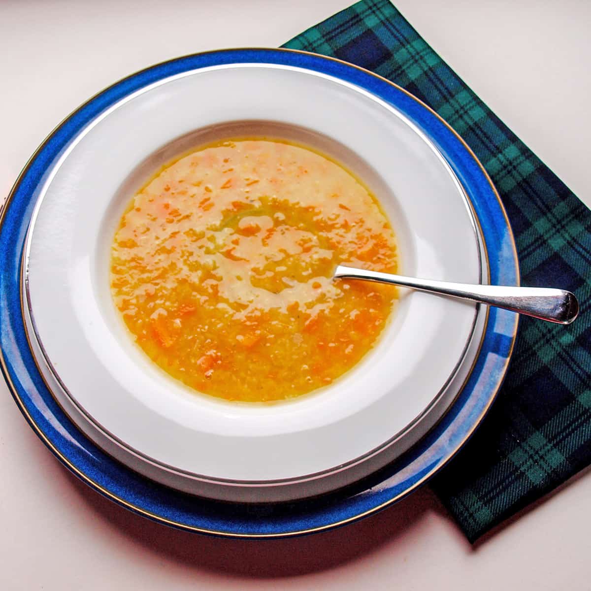 Scottish Red Lentil Soup in bowl with spoon