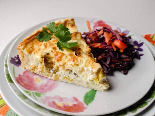 Slice of savoury tart with coleslaw