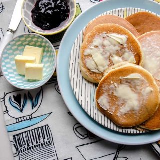 plate of buttered pancakes