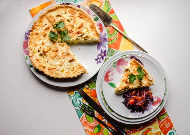 Leek tart with slice on plate