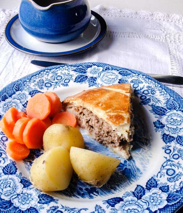 Serve the Pie with vegetables and gravy