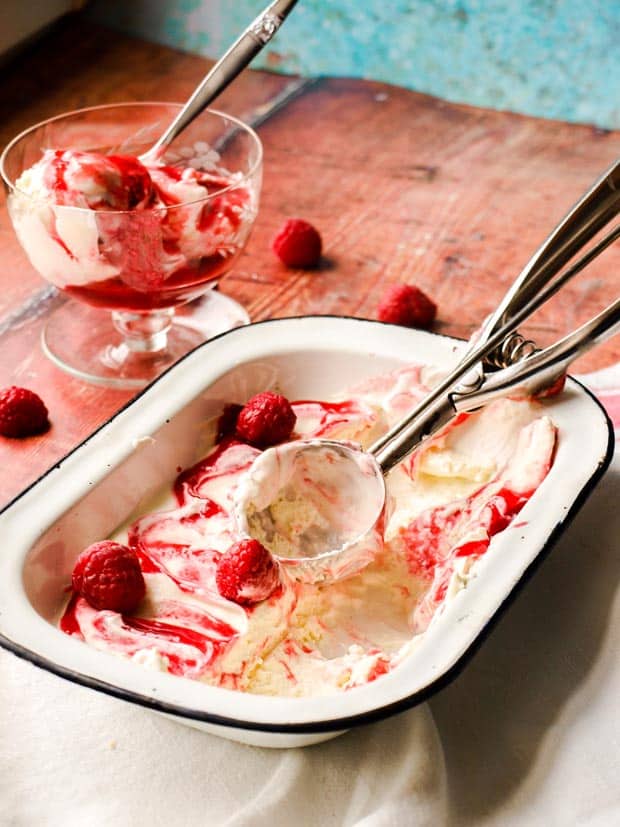 Lemon and Raspberry Ripple Ice Cream with scoop and bowl