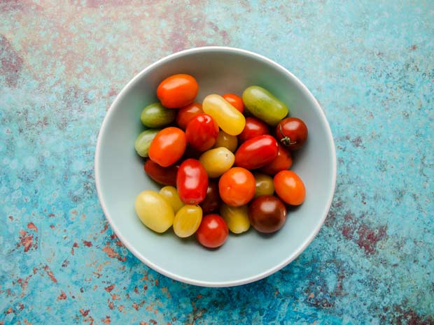 bowl of coloured cherry and grape tomatoes