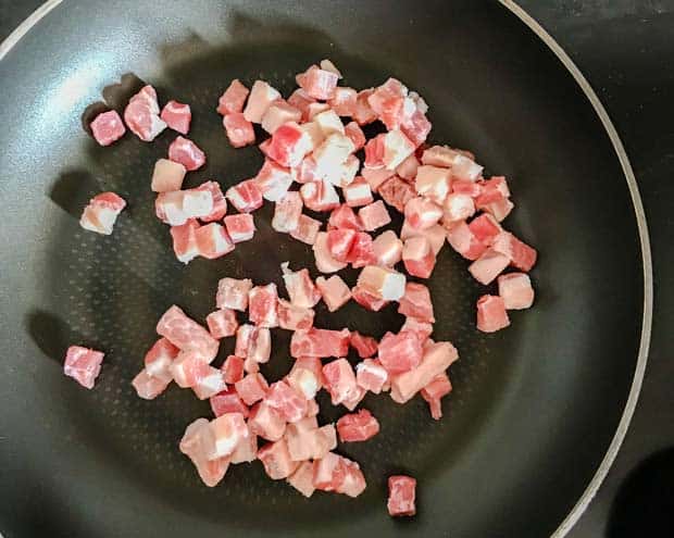bacon pieces in a pan