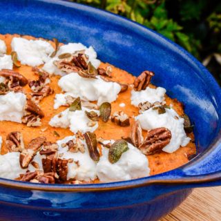 Blue serving dish with Sweet Poato Mash, ricotta, sage and pecan nuts