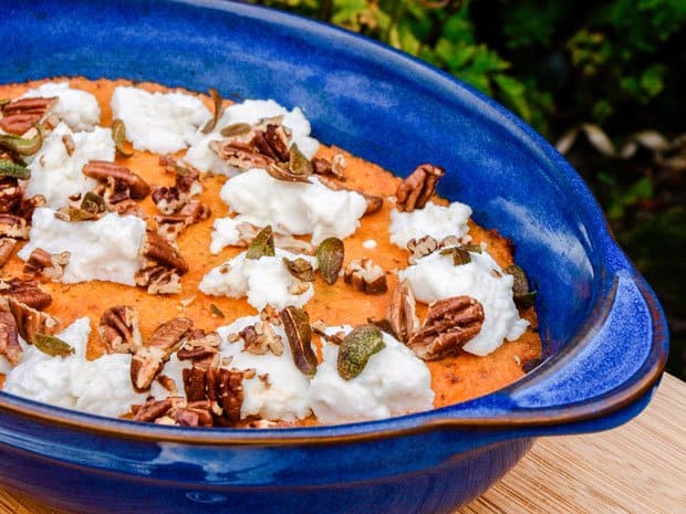 Blue serving dish with Sweet Poato Mash, ricotta, sage and pecan nuts