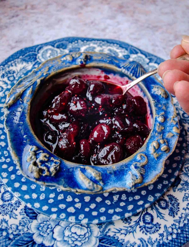 Bowl of Cranberry & Wine Sauce with spoon 