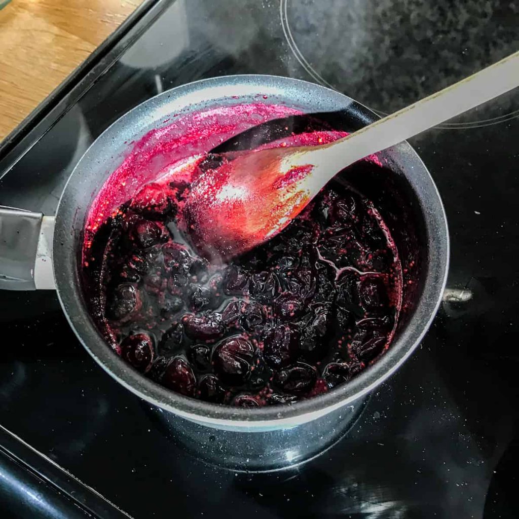 Pan of cooked Easy Cranberry & Red Wine Sauce