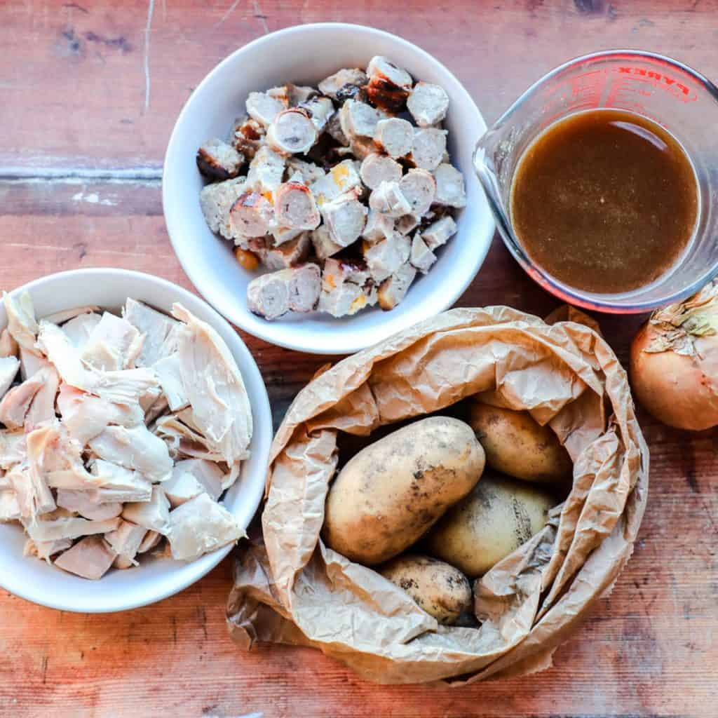 Cooked turkey pieces, potatoes gravy
